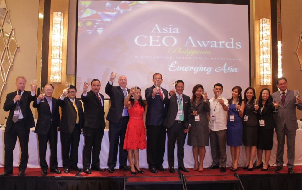 CELEBRATING BUSINESS EXCELLENCE:  Asia CEO Forum’s Richard Mills (rightmost) and PLDT ALPHA Enterprise’s Jovy Hernandez (8th from left) lead a toast during the launch of the 2014 Asia CEO Awards