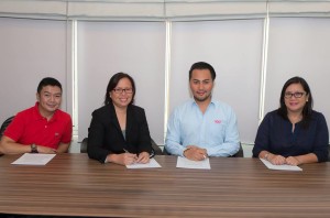 Online ticket sales for 2GoTravel with PinoyTravel. From left to right: Erwin Condenuevo, 2GoTravel Customer Interaction Center Manager; Au Soriano, PinoyTravel CEO and cofounder; Stephen Tagud, 2GoTravel Chief Commercial Officer; and Grace Golez, 2GoTravel AVP Retail Sales.