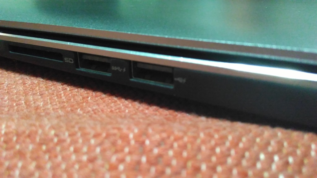 At the right side of the laptop you'll find the 3-in-1 media card reader, 1 USB 2.0 port, and 1 USB 3.0 port. 