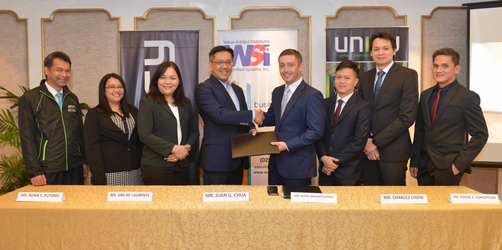 WSI President Juan Chua (fourth from left) shakes hands with Unify ASEAN Managing Director Daniel Mountstephen  after signing a partnership distibution deal. Joining them are (from left) WSI Product Manager Jeffrey Garay,  Senior Product Manager Reina Putong and Vice President for Solutions Division Jing Laurente; Unify ASEAN  Distribution Keith Tay and Pre-Sales Director Charles Chow; and Unify Philippines Country Manager Edwin Concepcion.